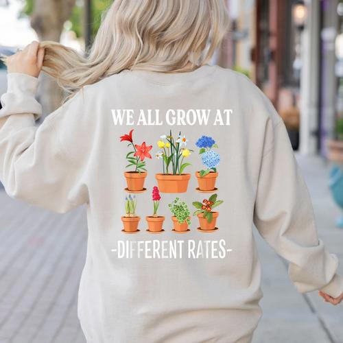 We All Grow At Different Rates Back To School Teacher Women's Sweatshirt Back Print - teacherstshirts.com CA