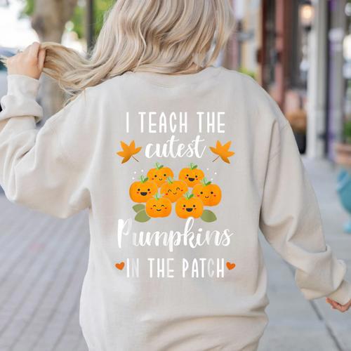 I Teach The Cutest Pumpkins In The Patch Halloween Teacher Women's Sweatshirt Back Print - teacherstshirts.com CA