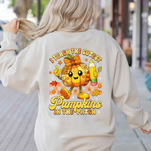 I Teach The Cutest Pumpkins In The Patch Teacher Halloween Women's Sweatshirt Back Print - teacherstshirts.com