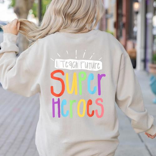 I Teach Future Superheroes Teacher Teaching Women's Sweatshirt Back Print - teacherstshirts.com
