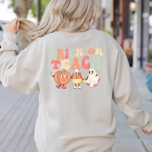 Trick Or Teach Pumpkin Candy Corn Ghost Halloween Teacher Women's Sweatshirt Back Print - teacherstshirts.com