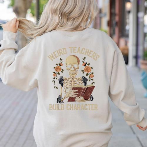 Weird Teachers Build Character Skeleton Book Halloween Women Women's Sweatshirt Back Print - teacherstshirts.com AU