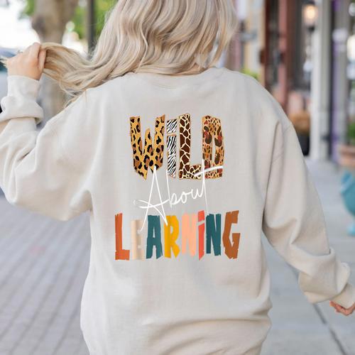 Wild About Learning Teacher Back To School Teaching Women's Sweatshirt Back Print - teacherstshirts.com