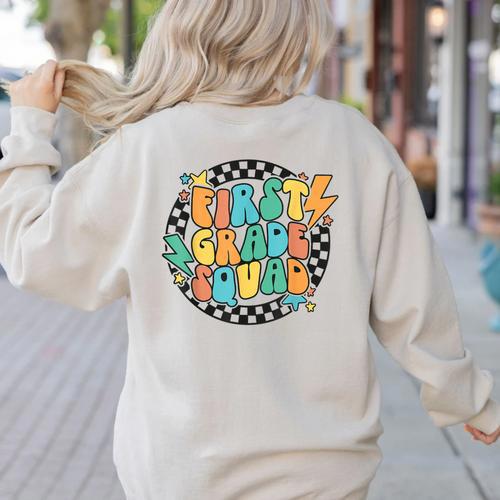Back To School Groovy Teacher 1st First Grade Crew Squad Women's Sweatshirt Back Print - teacherstshirts.com CA
