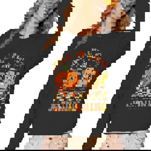 Fall In Love With Reading Book Autumn Pumpkins And Teachers Women Long Sleeve T-Shirt - teacherstshirts.com