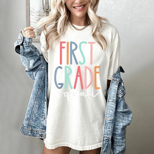 First Grade Squad 1st Grade Teacher Crew Back To School Team Women's Comfort Colors T-Shirt - teacherstshirts.com AU