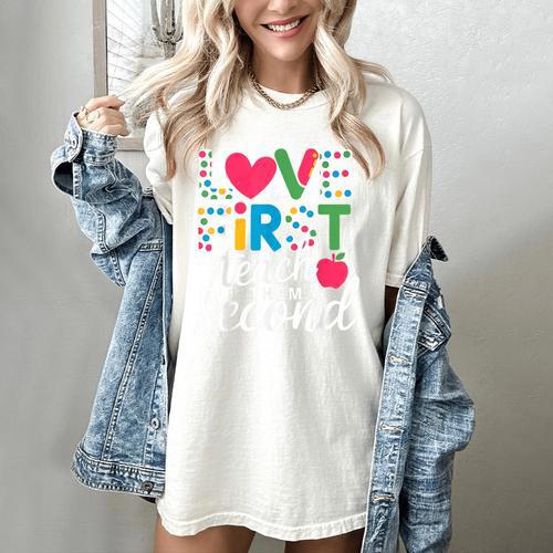 Love Them First Teach Them Second Teacher Student Love Quote Women's Comfort Colors T-Shirt - teacherstshirts.com DE