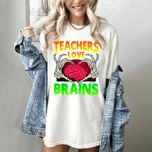 Teacher Teachers Love Brains Skeleton Hand Heart Halloween Women's Comfort Colors T-Shirt - teacherstshirts.com DE