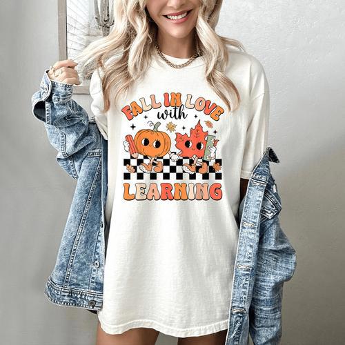 Retro Fall In Love With Learning Autumn Pumpkin Teacher Women's Comfort Colors T-Shirt - teacherstshirts.com AU