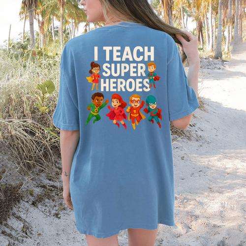 I Teach Super Heroes Teacher Women's Comfort Colors T-Shirt Back Print - teacherstshirts.com CA