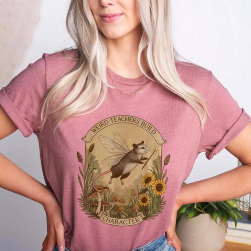 Cottagecore Fairy Opossum Weird Teachers Build Character Women's Heather T-Shirt - teacherstshirts.com CA