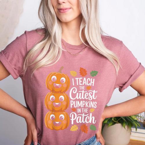 Teacher Halloween Tshirts I Teach The Cutest Pumpkins Women's Heather T-Shirt - teacherstshirts.com
