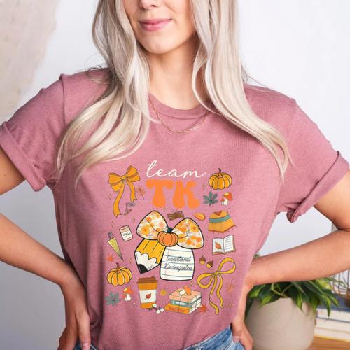 Team TK Crew Preppy Coquette Bow Pumpkin Fall TK Teacher Women's Heather T-Shirt - teacherstshirts.com UK