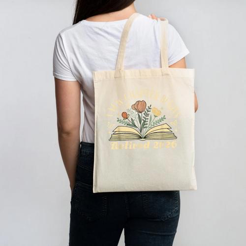 A New Chapter Begins Retired 2026 Teacher Retirement Canvas Tote Bag - teacherstshirts.com AU