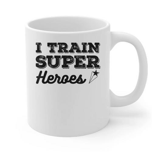 I Train Superheroes For Teacher Coach Men Women Graphic Print Coffee Mug - teacherstshirts.com