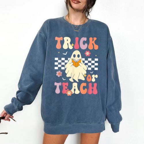 Groovy Teacher Halloween Retro Trick Or Teach Floral Ghost Comfort Colors Sweatshirt - teacherstshirts.com AU