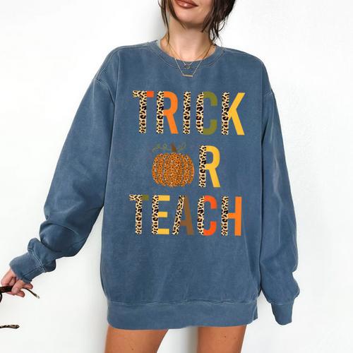 Leopard Trick Or Teach Halloween Teacher Costume Women Comfort Colors Sweatshirt - teacherstshirts.com CA