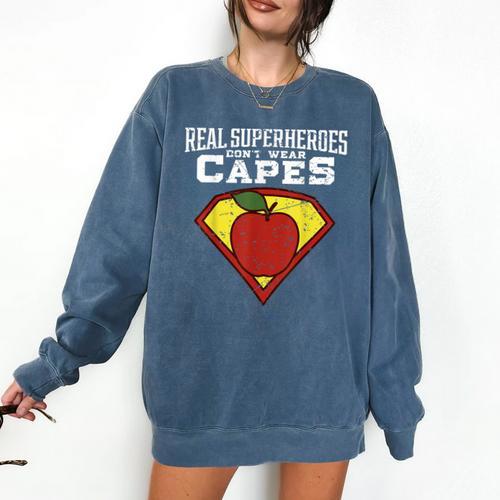 Real Superheroes Don't Wear Capes Teacher Shirt Teaching Te Comfort Colors Sweatshirt - teacherstshirts.com DE