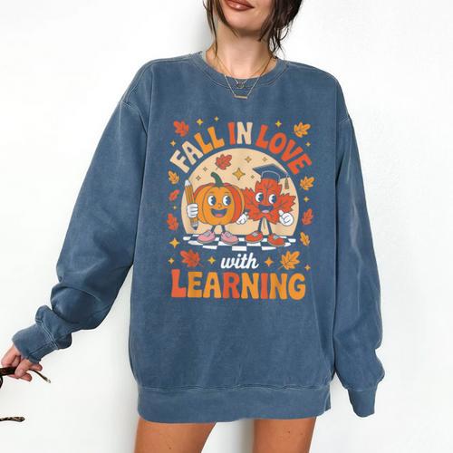 Retro Fall In Love With Learning Pumpkin Leaf Teacher Autumn Comfort Colors Sweatshirt - teacherstshirts.com AU