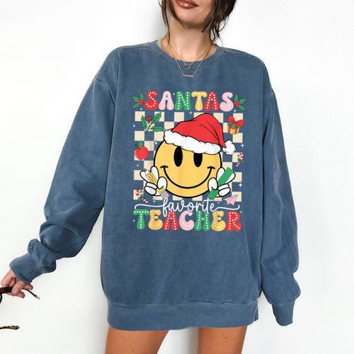 Santas Favorite Teacher Retro Groovy Smile Face Christmas Comfort Colors Sweatshirt - teacherstshirts.com CA