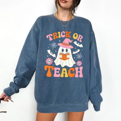 Trick Or Teach Cute Floral Ghost Teacher Halloween Costume Comfort Colors Sweatshirt - teacherstshirts.com CA