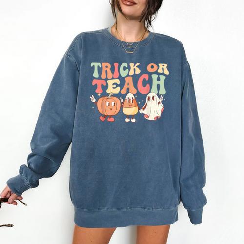 Trick Or Teach Pumpkin Candy Corn Ghost Halloween Teacher Comfort Colors Sweatshirt - teacherstshirts.com