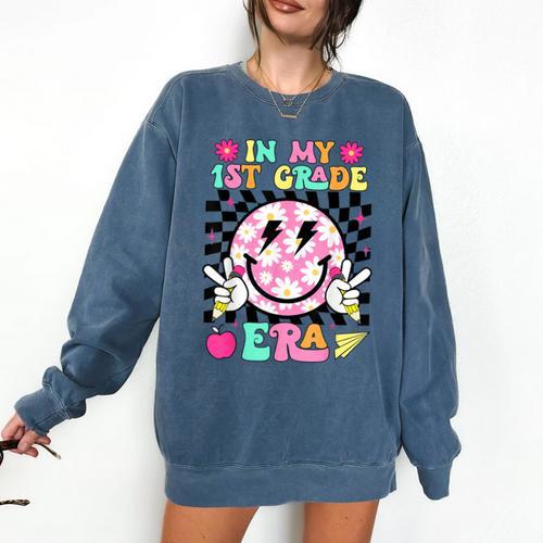 In My 1st Grade Era Smile Face Back To School Teacher Kid Comfort Colors Sweatshirt - teacherstshirts.com
