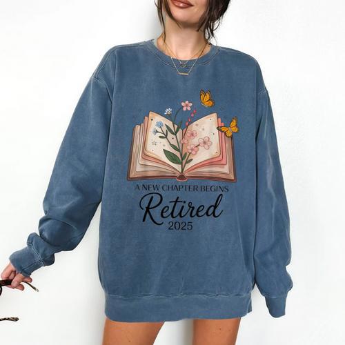 Retired 2025 A New Chapter Begins Retirement Teacher Book Comfort Colors Sweatshirt - teacherstshirts.com UK