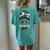 Saints Girl Messy Bun Women's Oversized Comfort T-Shirt Back Print Chalky Mint