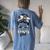 Saints Girl Messy Bun Women's Oversized Comfort T-Shirt Back Print Blue Jean