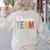 Dream Team Last Day Of School Back To School Teacher Kids Women's Sweatshirt Back Print Sand