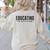 Educating Is Activism Feminist Social Justice Teacher For Men Women Women's Sweatshirt Back Print Sand