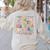 In My Maestra Era Spanish Bilingual Teacher First Day Women's Sweatshirt Back Print Sand
