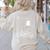 Read In Peace Skeleton Halloween Book Reading Spooky Teacher Women's Sweatshirt Back Print Sand