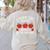 I Teach The Cutest Apples In The Orchard Cute Fall Teacher Women's Sweatshirt Back Print Sand