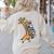 Teacher Shirt Giraffe Holding Books Bookworm Librarian Women's Sweatshirt Back Print Sand