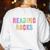 READING ROCKS English Teacher ELA ABCD Read Star Kinder Women's Sweatshirt Back Print White READING ROCKS English Teacher ELA ABCD Read Star Kinder Women's Sweatshirt Back Print White