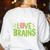 Teachers Love Brains Halloween Teacher Zombie Women's Sweatshirt Back Print White Teachers Love Brains Halloween Teacher Zombie Women's Sweatshirt Back Print White