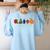 Back To School Cute Hungry Lover Fruits Teacher Women's Sweatshirt Back Print Light Blue