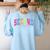 Back To School Neon Checkered Second Grade Colorful Teacher Women's Sweatshirt Back Print Light Blue