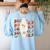 Booooks Ghost Halloween Groovy Vintage Teacher Book Reading Women's Sweatshirt Back Print Light Blue Booooks Ghost Halloween Groovy Vintage Teacher Book Reading Women's Sweatshirt Back Print Light Blue