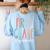 First Grade Squad 1st Grade Teacher Crew Back To School Team Women's Sweatshirt Back Print Light Blue