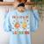 Groovy Fall In Love With Learning Autumn Pumpkin Teacher Women's Sweatshirt Back Print Light Blue