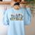 Groovy Tiny Human Tamer Floral Kindergarten Teacher Women's Sweatshirt Back Print Light Blue