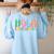 Hola Estudiantes Maestra Back To School Spanish Teacher Women's Sweatshirt Back Print Light Blue
