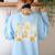 Inclusion Isn't Scary Mummy Boo Ghost Halloween SLP Teacher Women's Sweatshirt Back Print Light Blue