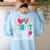 Love Them First Teach Them Second Teacher Student Love Quote Women's Sweatshirt Back Print Light Blue