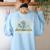 A New Chapter Begins Retired 2026 Teacher Retirement Women's Sweatshirt Back Print Light Blue A New Chapter Begins Retired 2026 Teacher Retirement Women's Sweatshirt Back Print Light Blue