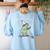 Off To Teach English Scooter Frog ESL Teacher Literature Women's Sweatshirt Back Print Light Blue
