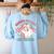 Retro Pink Christmas Santa's Favorite Art Teacher Artist Women's Sweatshirt Back Print Light Blue